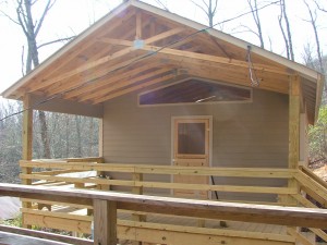 Front, covered porch of new cabin